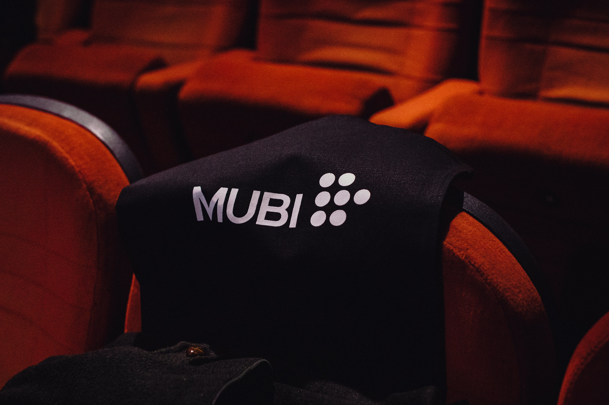 Mubi tote bag on red GFT Cinema chairs