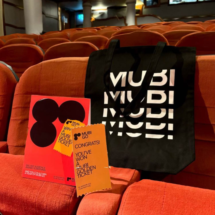 Mubi tote bag on red GFT Cinema chairs