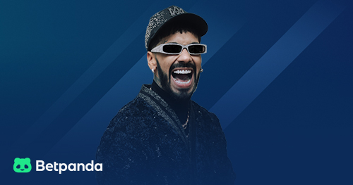 Man wearing sunglasses and dark clothing against gradient background